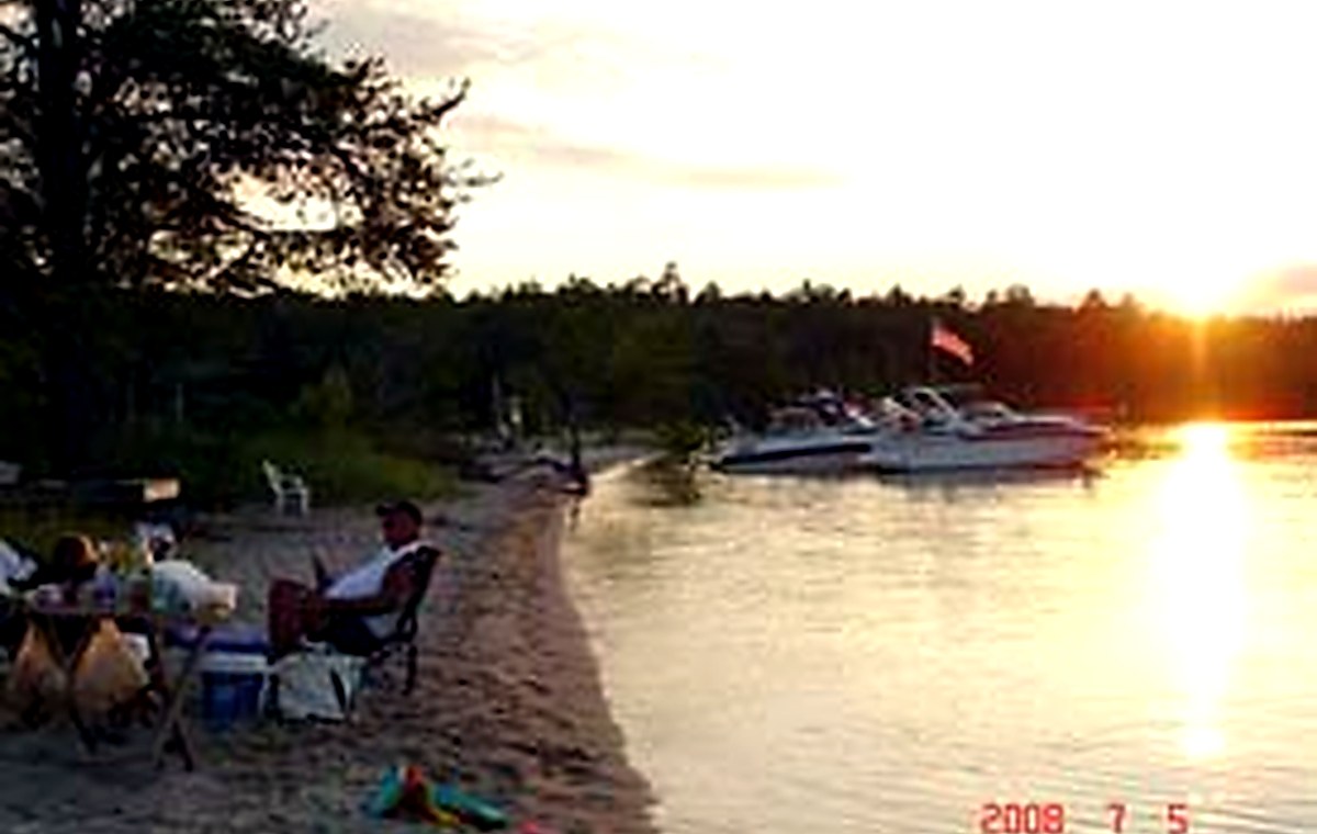 Sebago Boating Club Beach and sandbar on the west shore of Sebago Lake