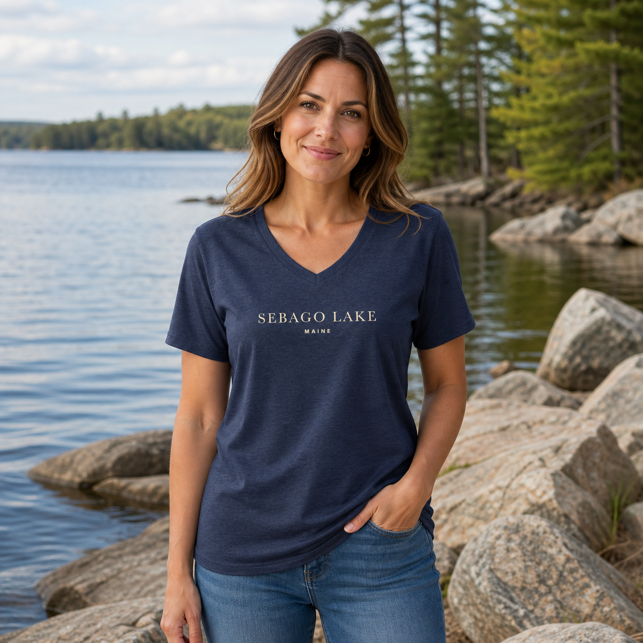 Woman wearing Sebago Lake Maine Minimalist Women’s V-Neck T-Shirt in Heather Navy