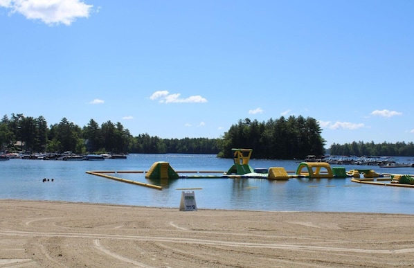 Shared Point Sebago resort beach shown in this property’s listing